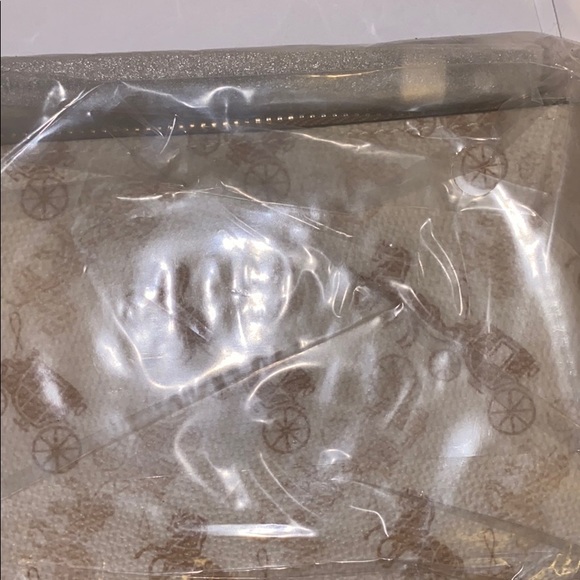 COACH Horse and carriage cream & beige wristlet - Picture 9 of 12